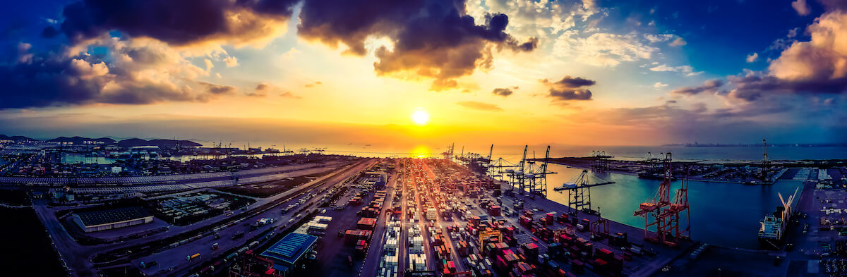 How to manufacture a product: cargo container terminal during sunset